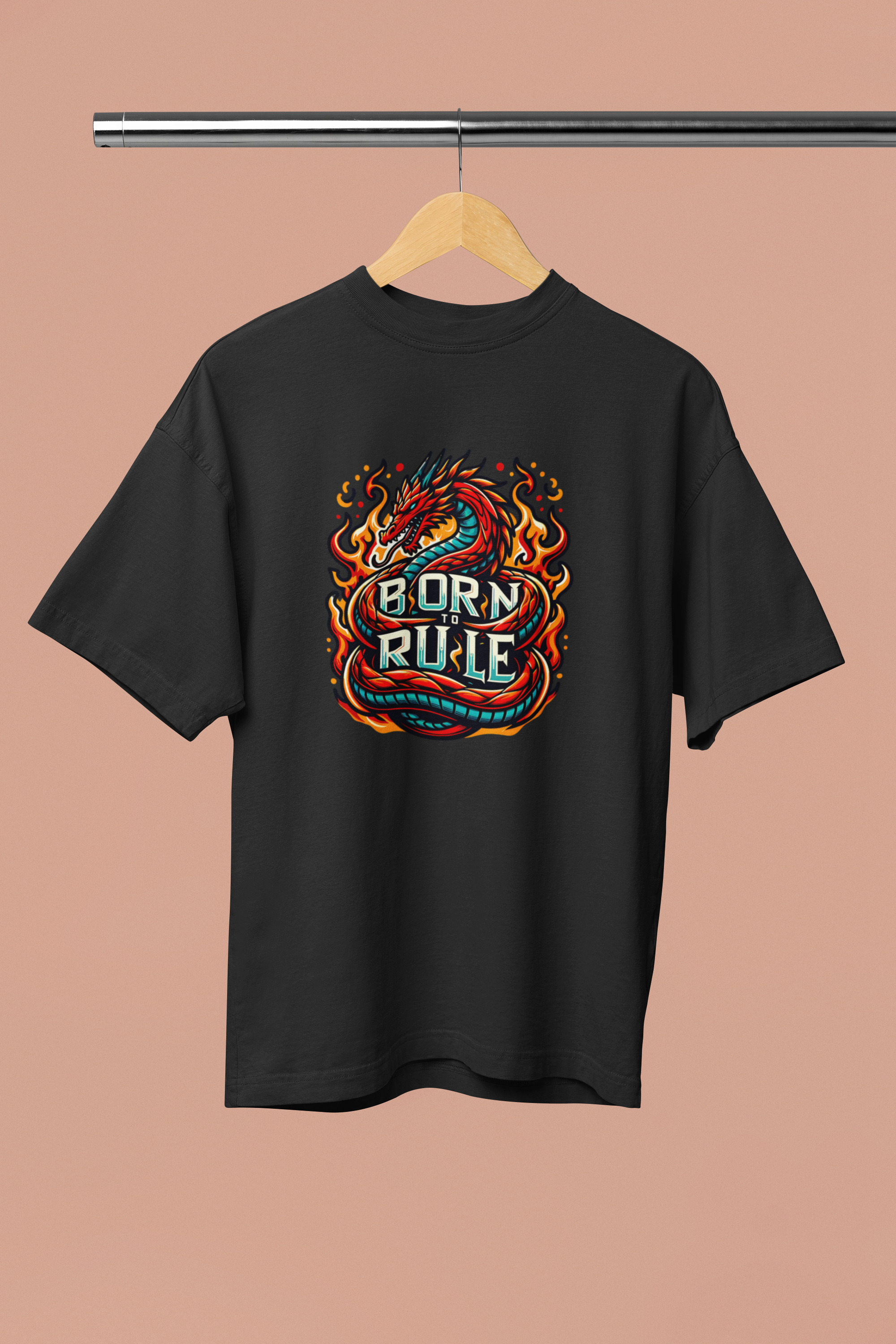 Black t-shirt with a colorful dragon design and 'Born to Rule' text on a beige background